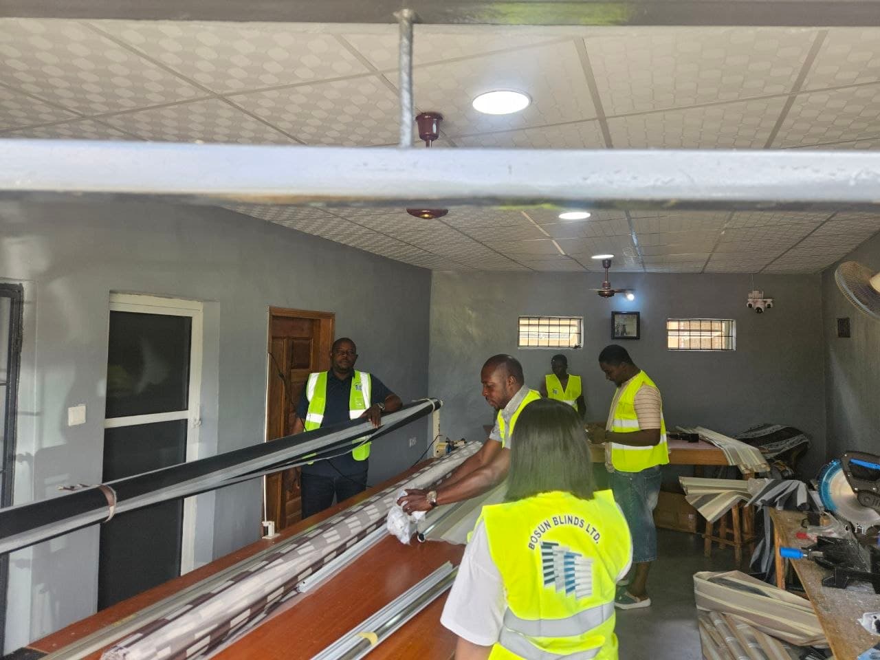 The Bosun Blinds team cutting and assembling blinds in their Ibadan workshop